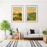 Living room with two framed posters of Dubai Creek and Emirates GC, plants, and a white sofa.
